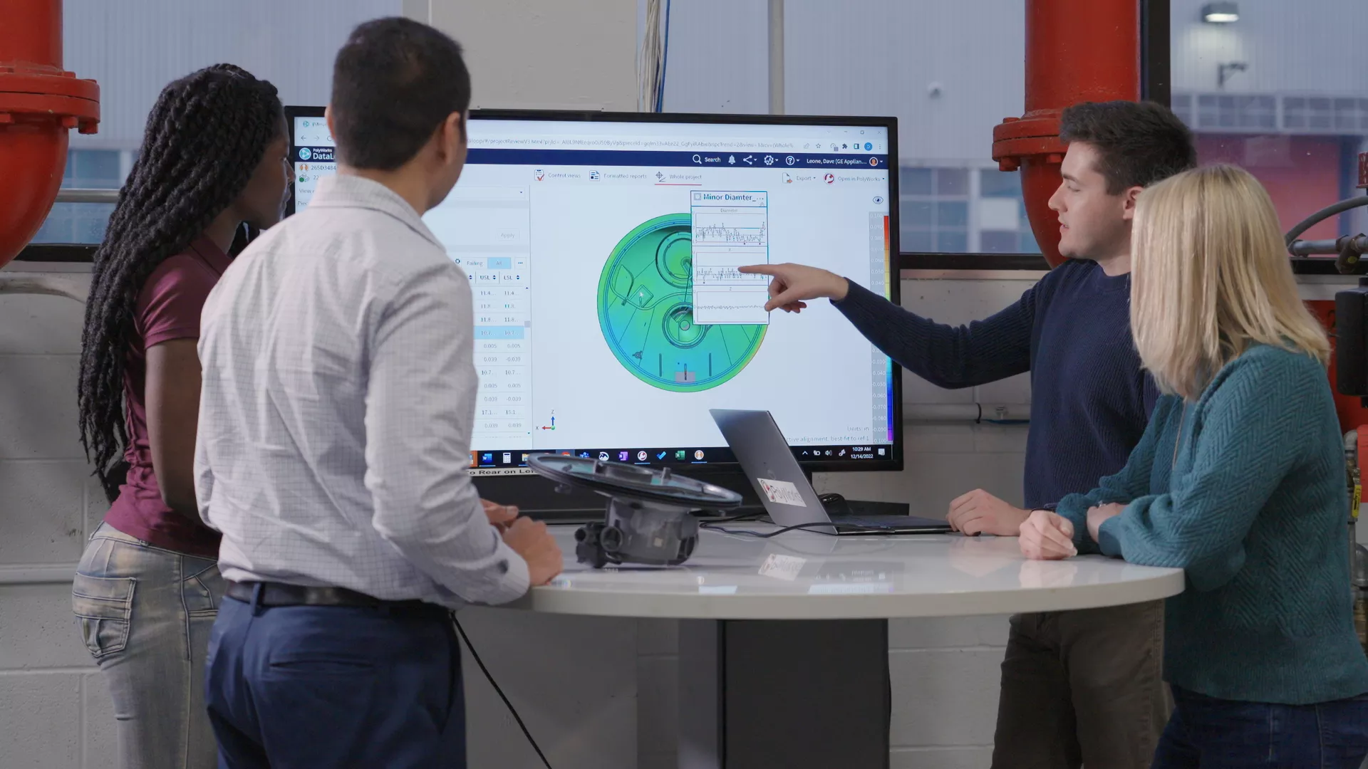 Collaborators inspect the 3D model of a piece they just measured using PolyWorks|Inspector